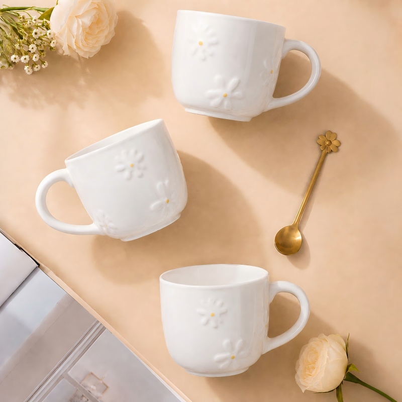 Tasse à café en céramique marguerite en relief